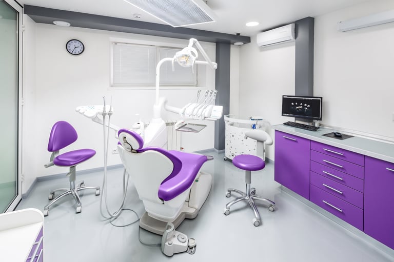 Modern dental office with purple chairs