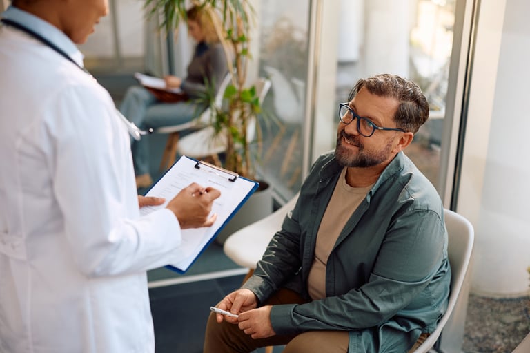 Doctor consulting with patient about preventive care